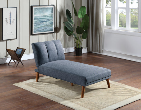 Blue fabric chaise lounge with wooden legs on a neutral rug