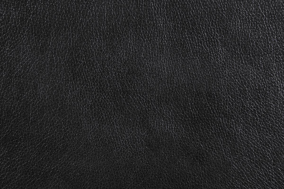 Black genuine leather texture showcasing fine grain for upholstery and fashion