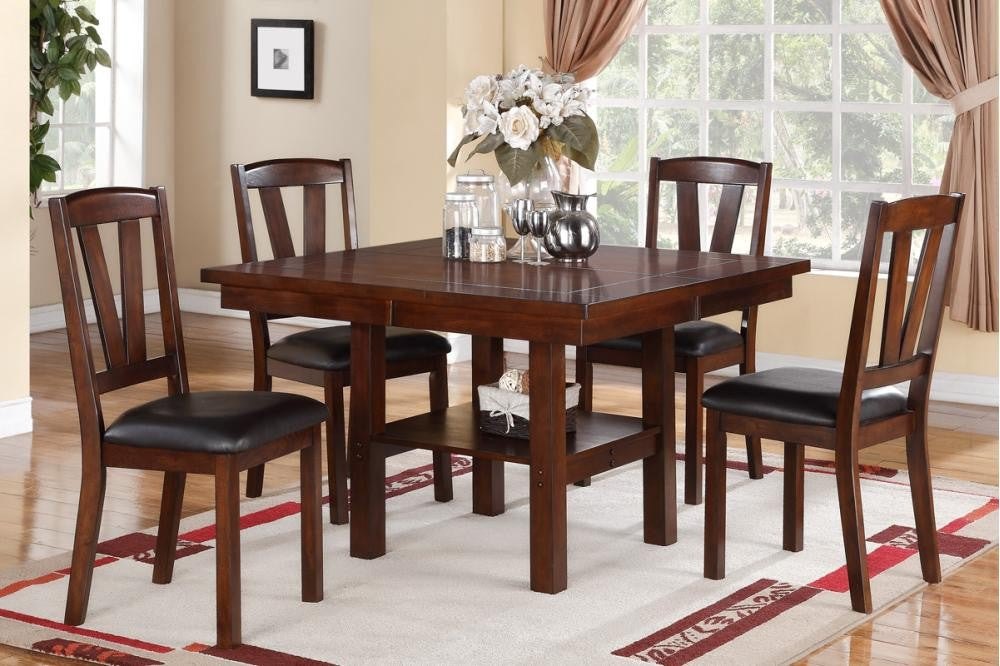 Dark wood dining table with four black upholstered chairs and a builtin shelf