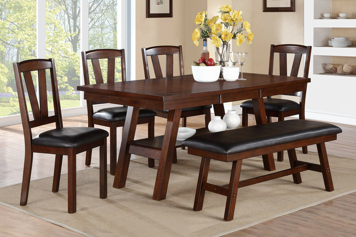Dark cherry wood dining table with upholstered black leather seating for six