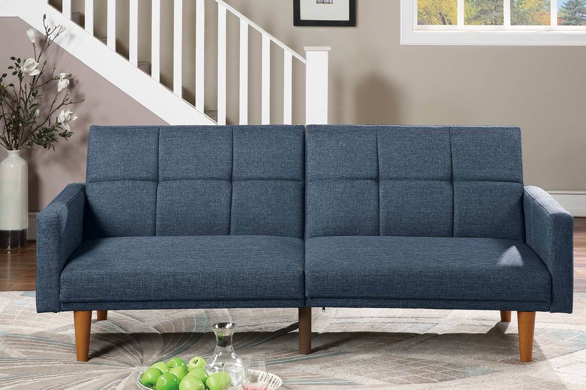 Modern blue fabric sofa with tufted cushions and tapered wooden legs