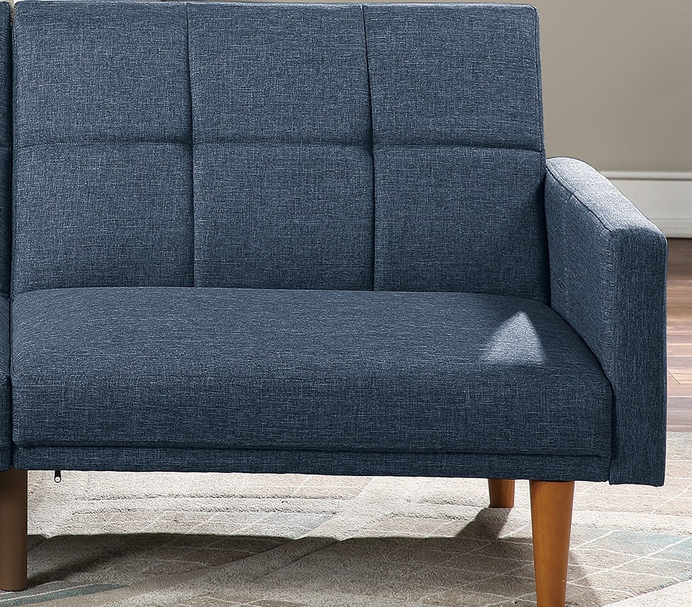 Dark blue upholstered sofa with tufted backrest and wooden legs