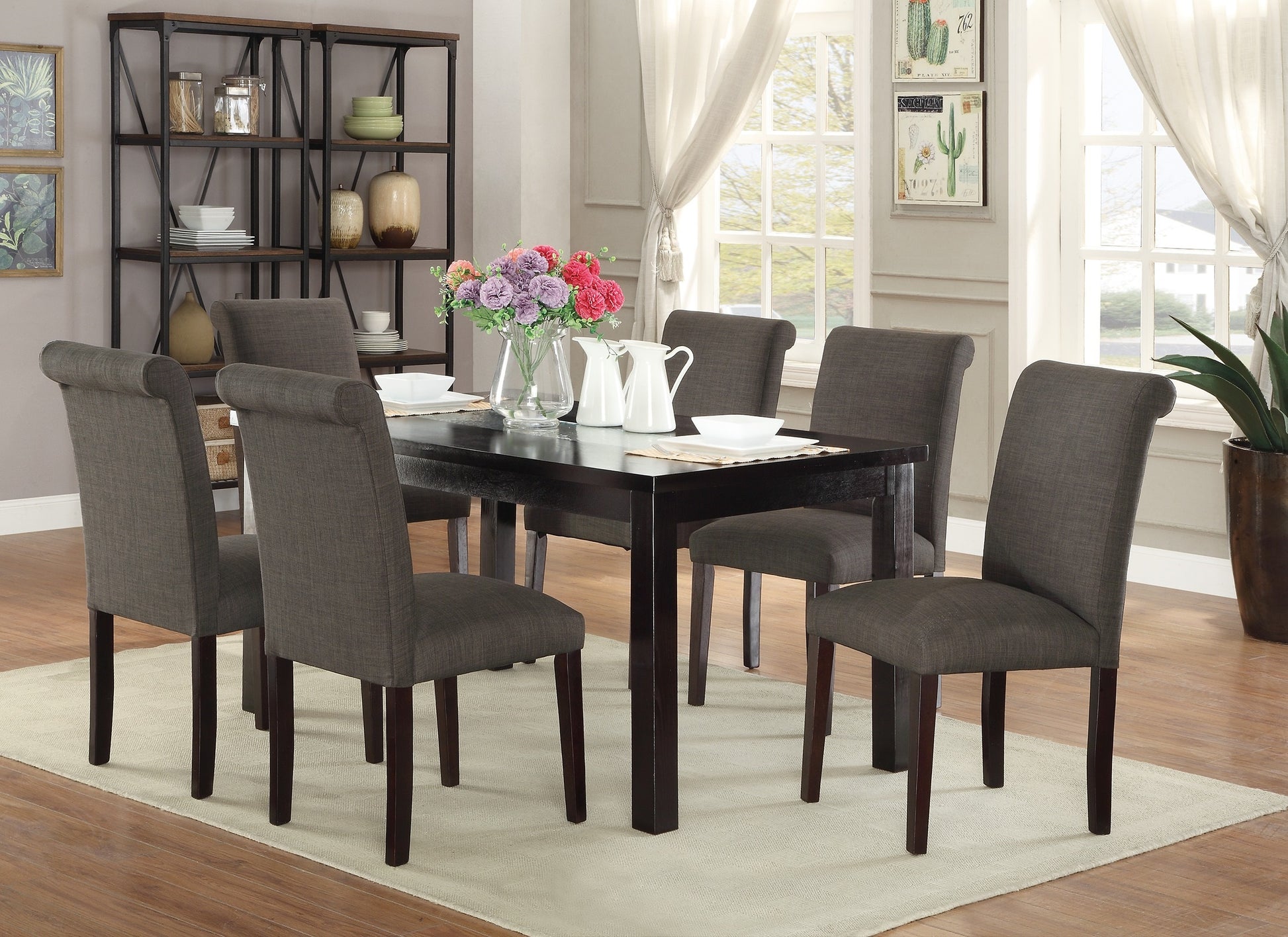 Dark brown rectangular dining table with six upholstered chairs in a contemporary setting