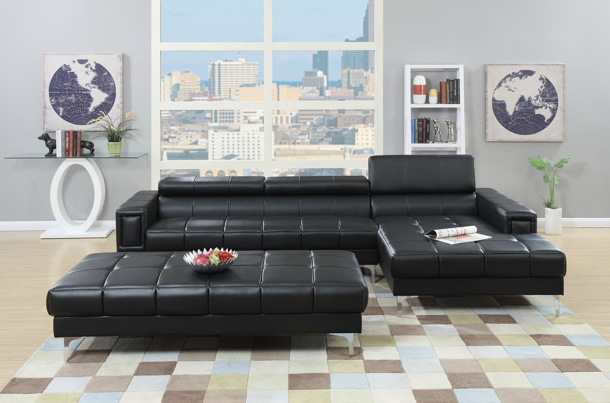 Black leather sectional sofa with tufted cushions and silver legs perfect for modern living rooms