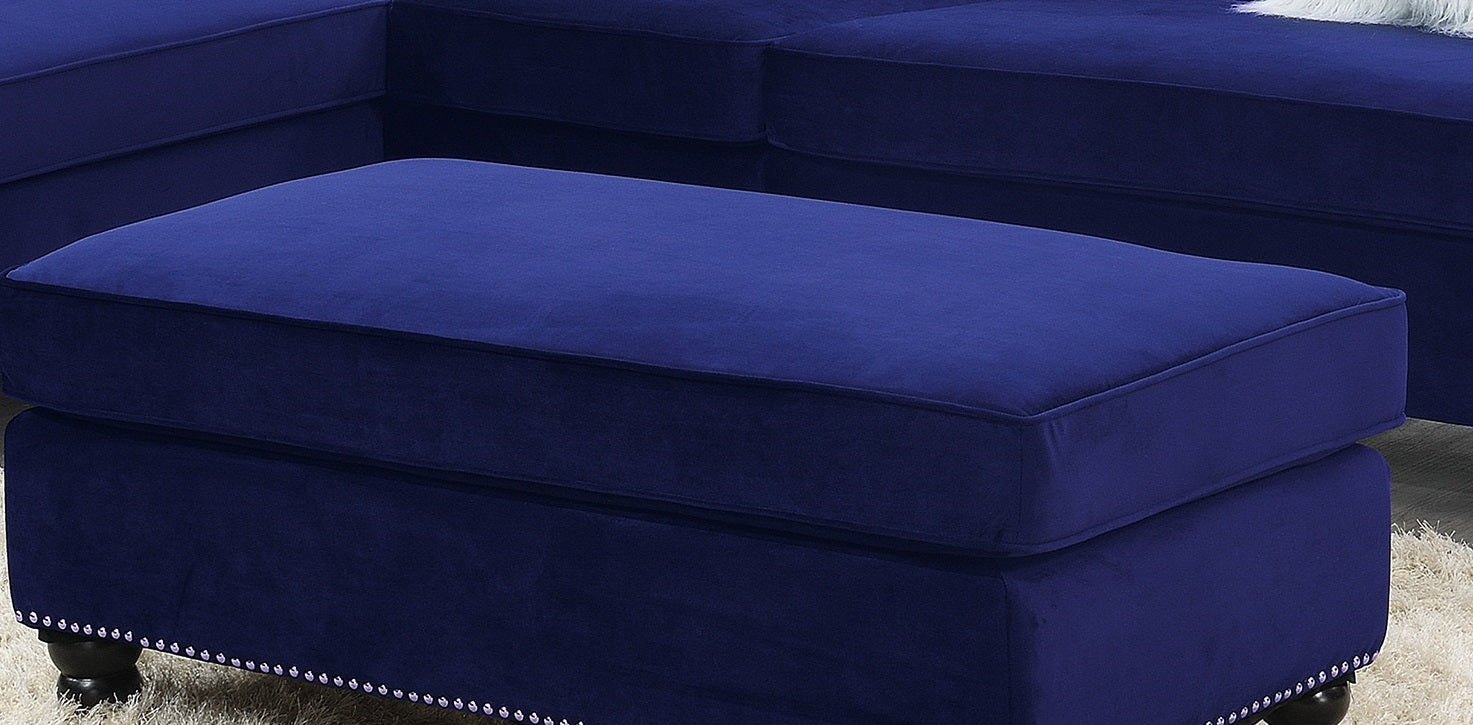 Plush navy blue velvet ottoman with decorative nailhead trim and dark wooden legs