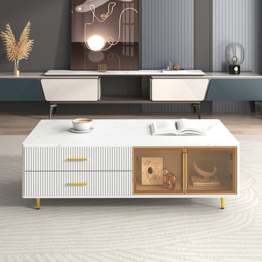 White marble coffee table with fluted drawers and gold accents