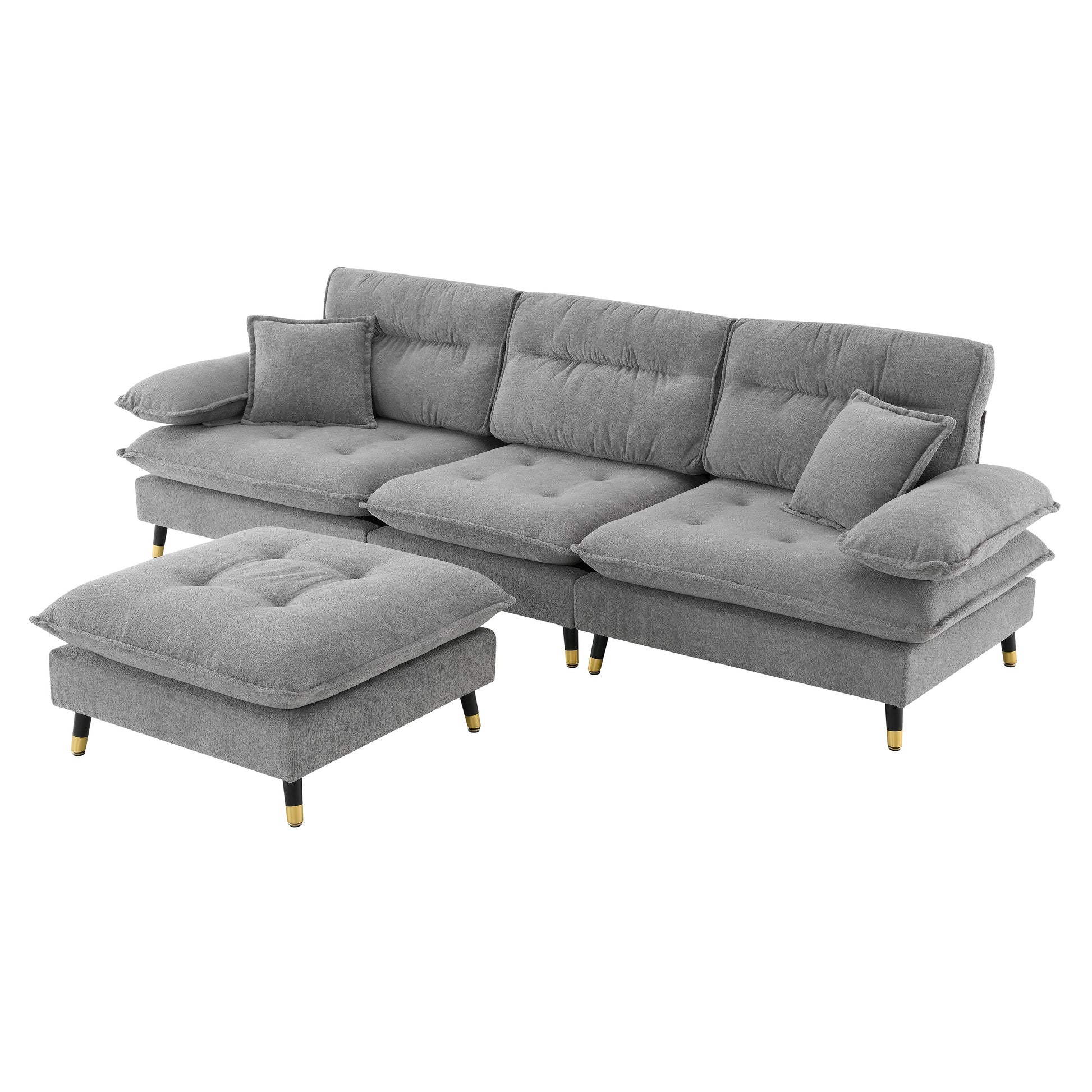 Tufted grey fabric sectional sofa with plush cushions and goldaccented black legs perfect for living rooms