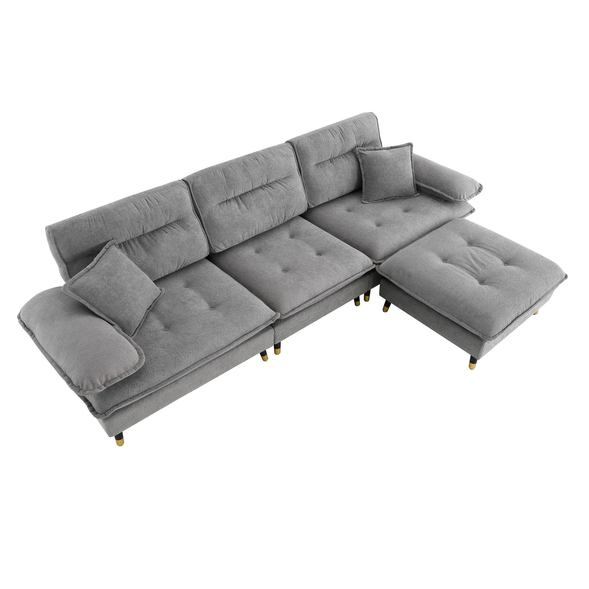 Plush grey fabric sectional sofa with button tufting and goldtipped legs