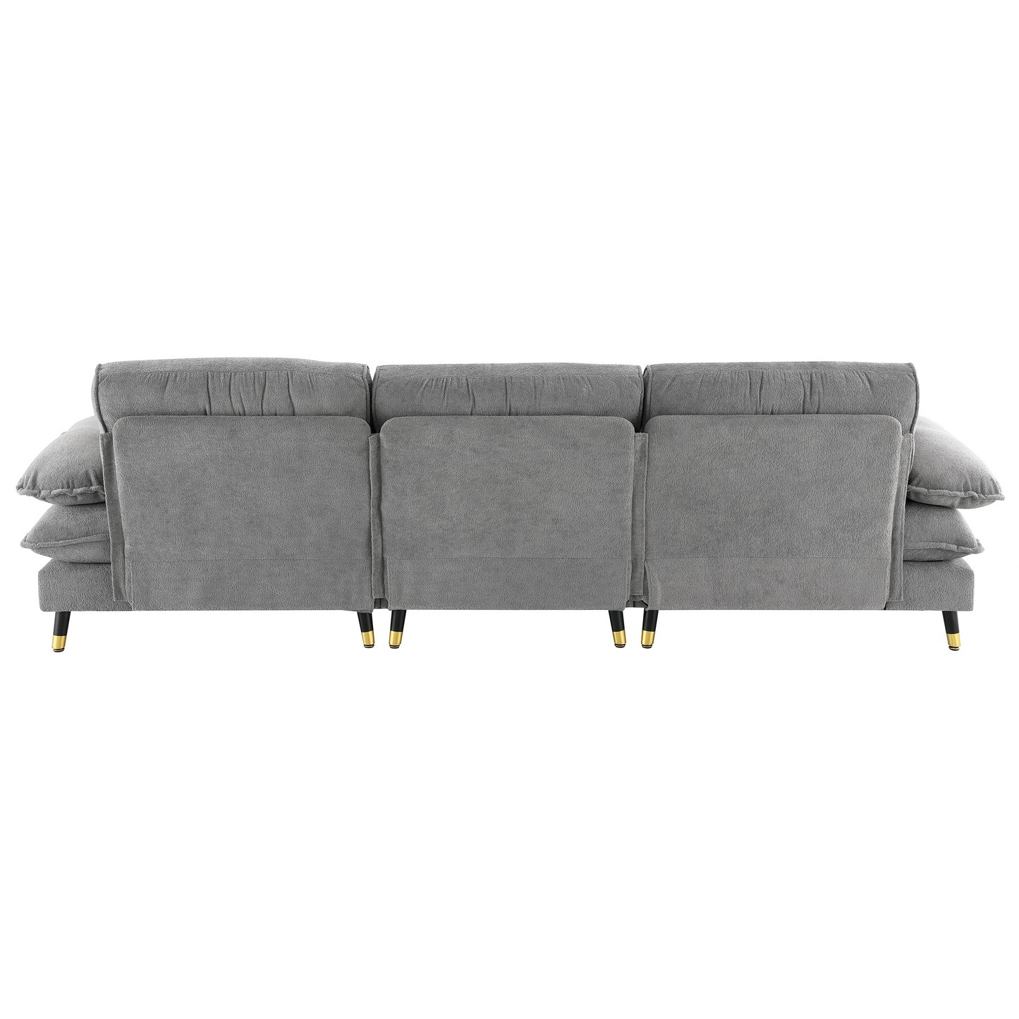 Plush gray threeseater sofa with tufted back cushions and goldtipped black legs