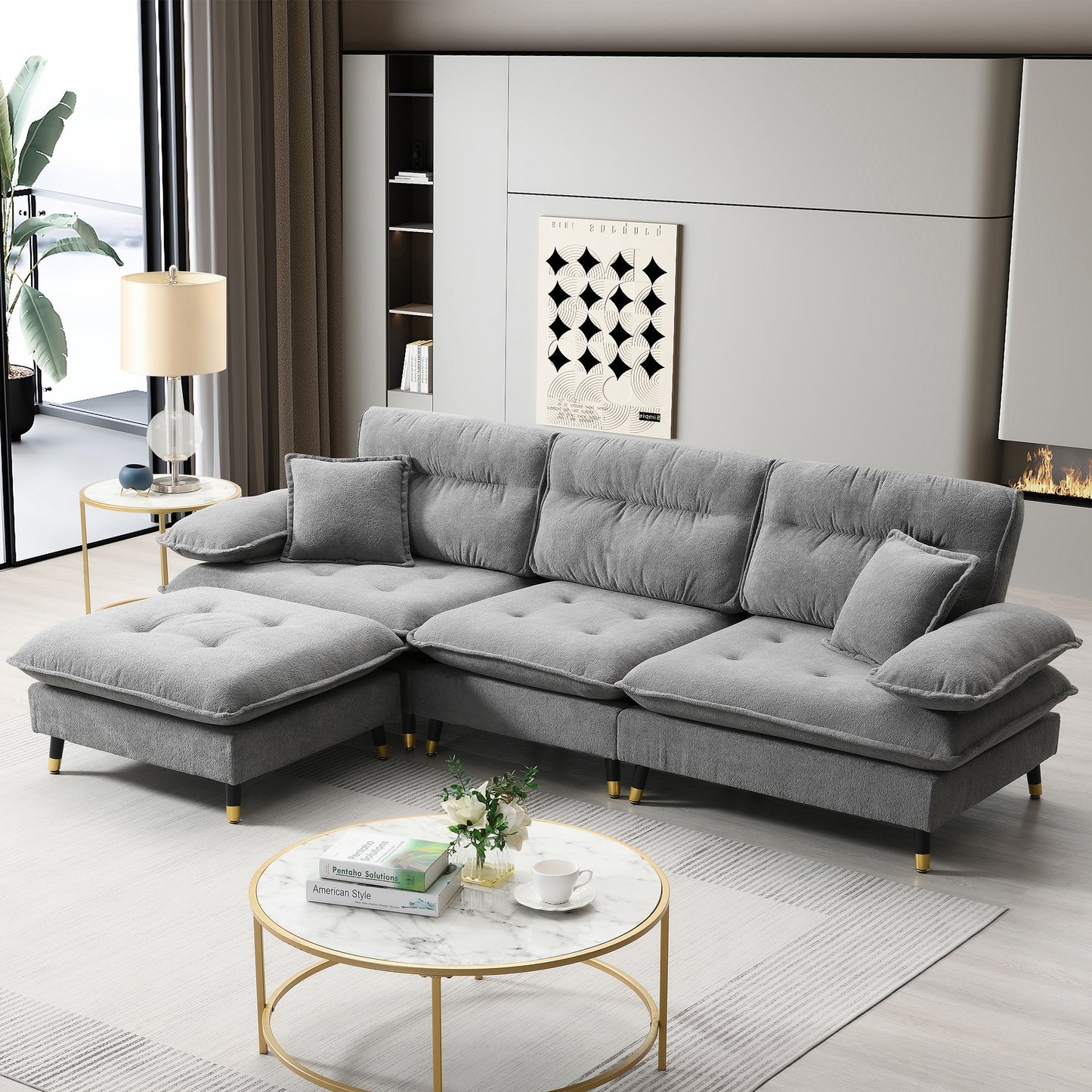 Plush grey sectional sofa with chaise and gold accents perfect for modern living rooms