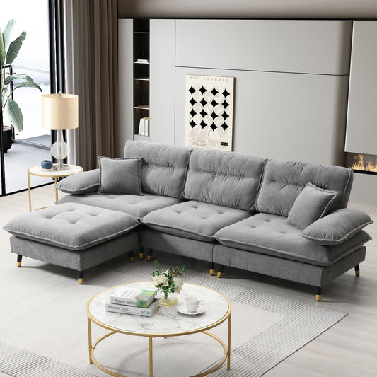 Plush grey sectional sofa with chaise and gold accents perfect for modern living rooms
