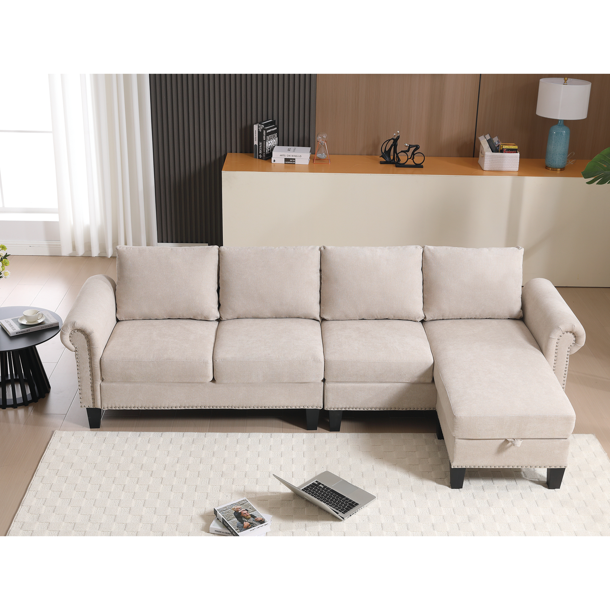 Beige fabric sectional sofa with nailhead trim perfect for a modern living room