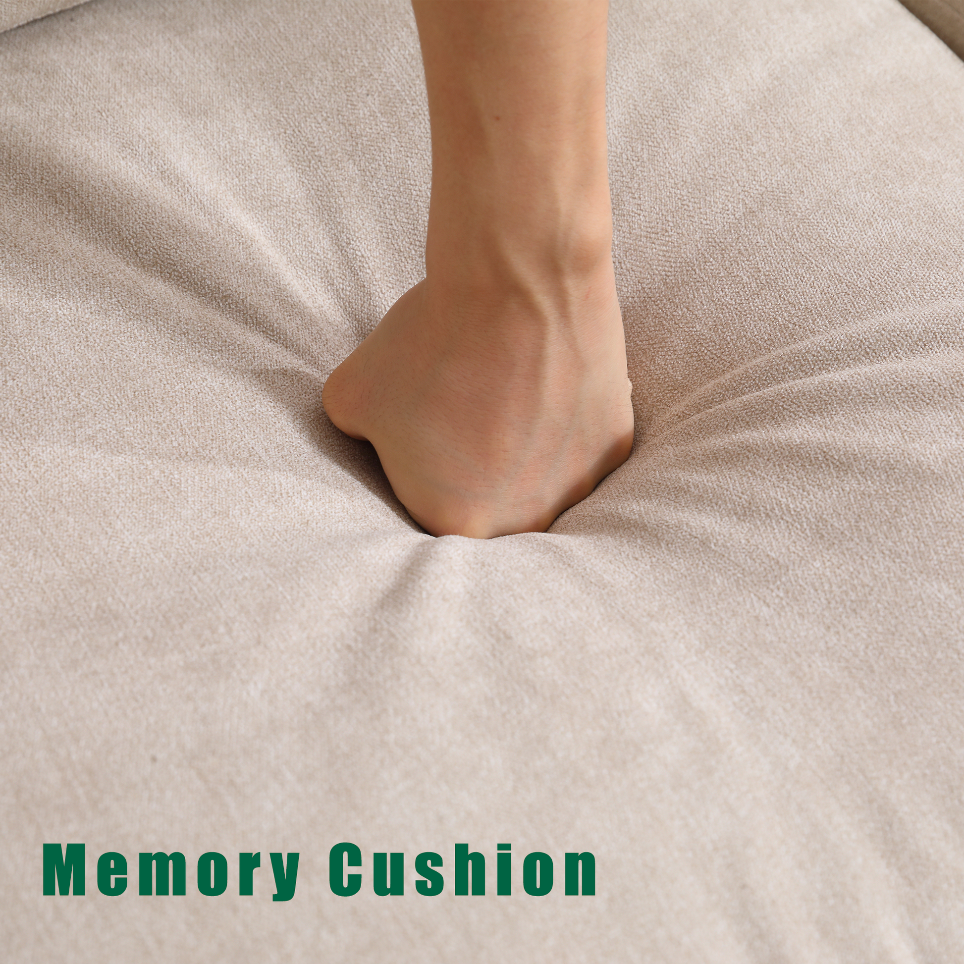 Hand pressing into a plush beige memory cushion demonstrating comfort
