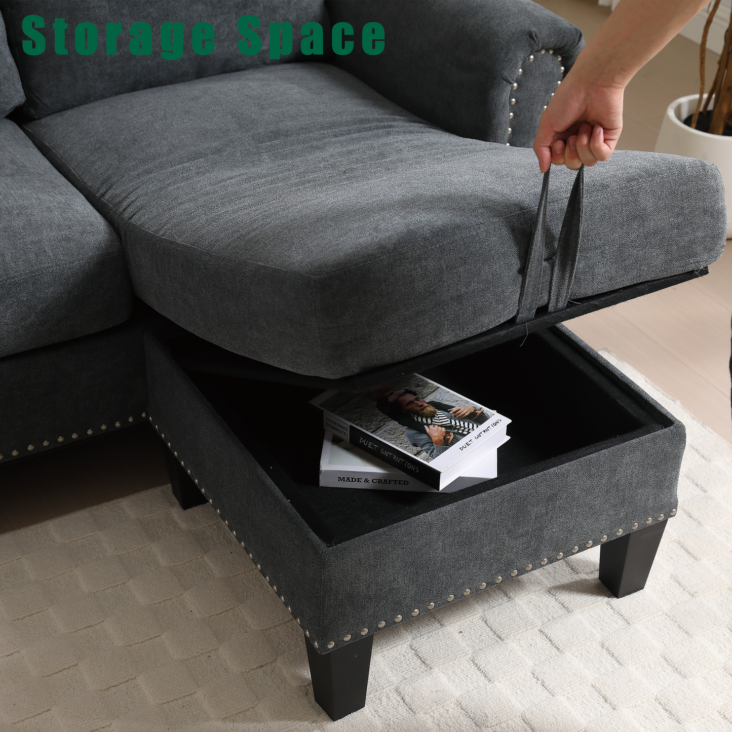 Dark grey fabric sectional sofa with hidden storage compartment on ottoman