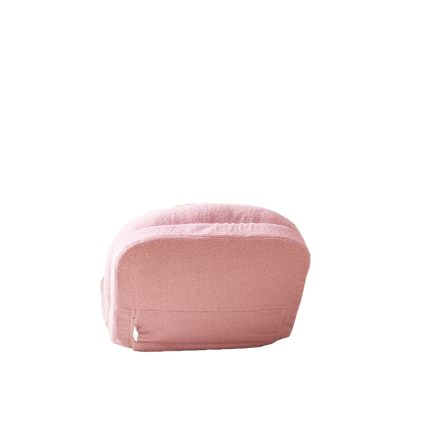Soft pink boucl armchair with rounded silhouette and visible zipper detail