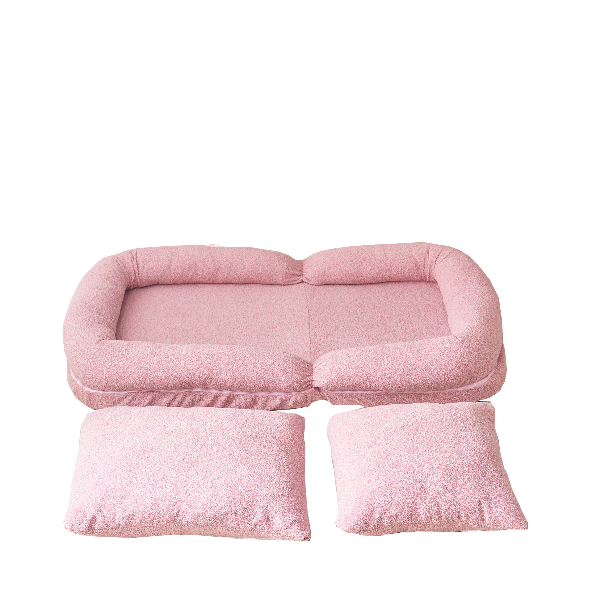 Plush pink dog bed with bolster and separate cushions for ultimate pet comfort