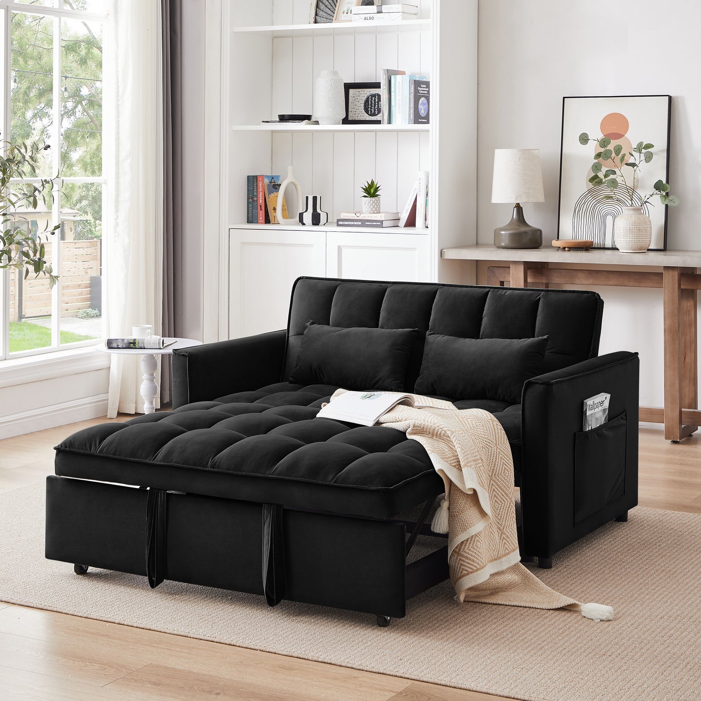 Tufted black velvet futon sofa bed with storage and side pocket ideal for small spaces