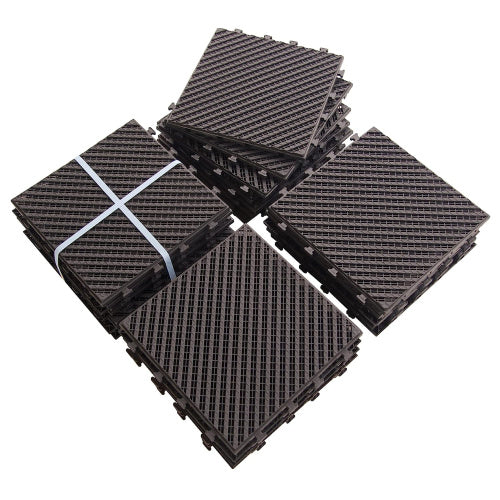 Stack of dark brown interlocking floor tiles with textured grid pattern ideal for garage or gym floors