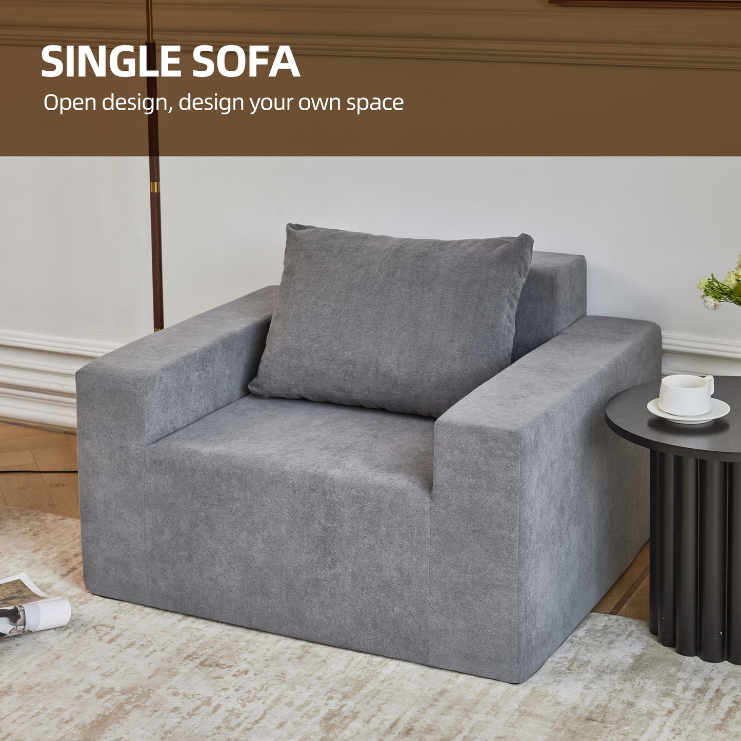 Modern grey fabric single sofa with a comfortable back cushion