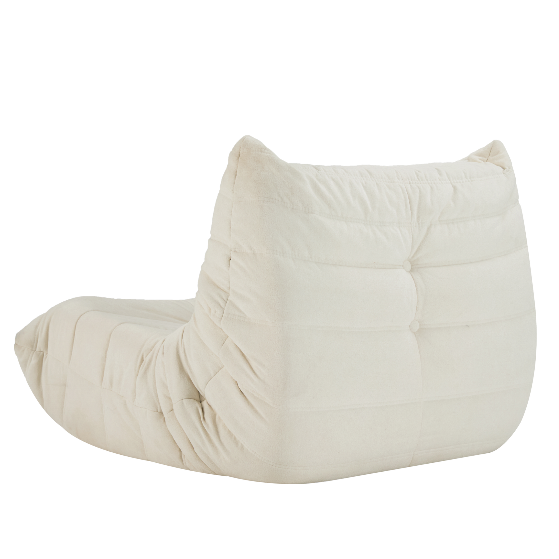 Cream upholstered tufted floor lounge chair with soft fabric and button accents