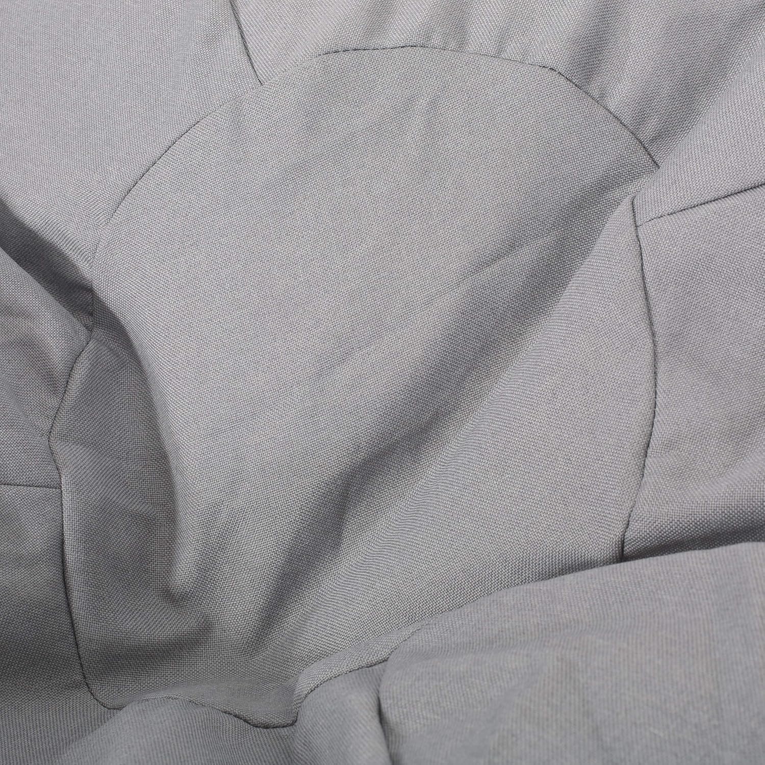 Closeup of textured grey fabric with subtle stitching detail perfect for a modern armchair upholstery