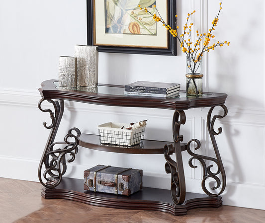 Ornate dark wood console table with glass top featuring decorative scroll metal legs and three shelves for display