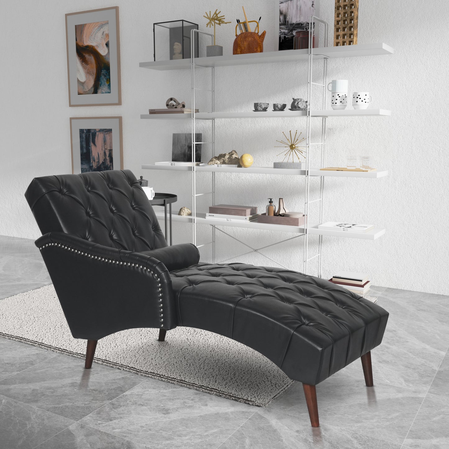 Black tufted chaise lounge with silver nailhead trim and dark wood legs perfect for a stylish living room
