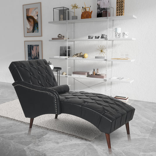 Black tufted chaise lounge with silver nailhead trim and dark wood legs perfect for a stylish living room