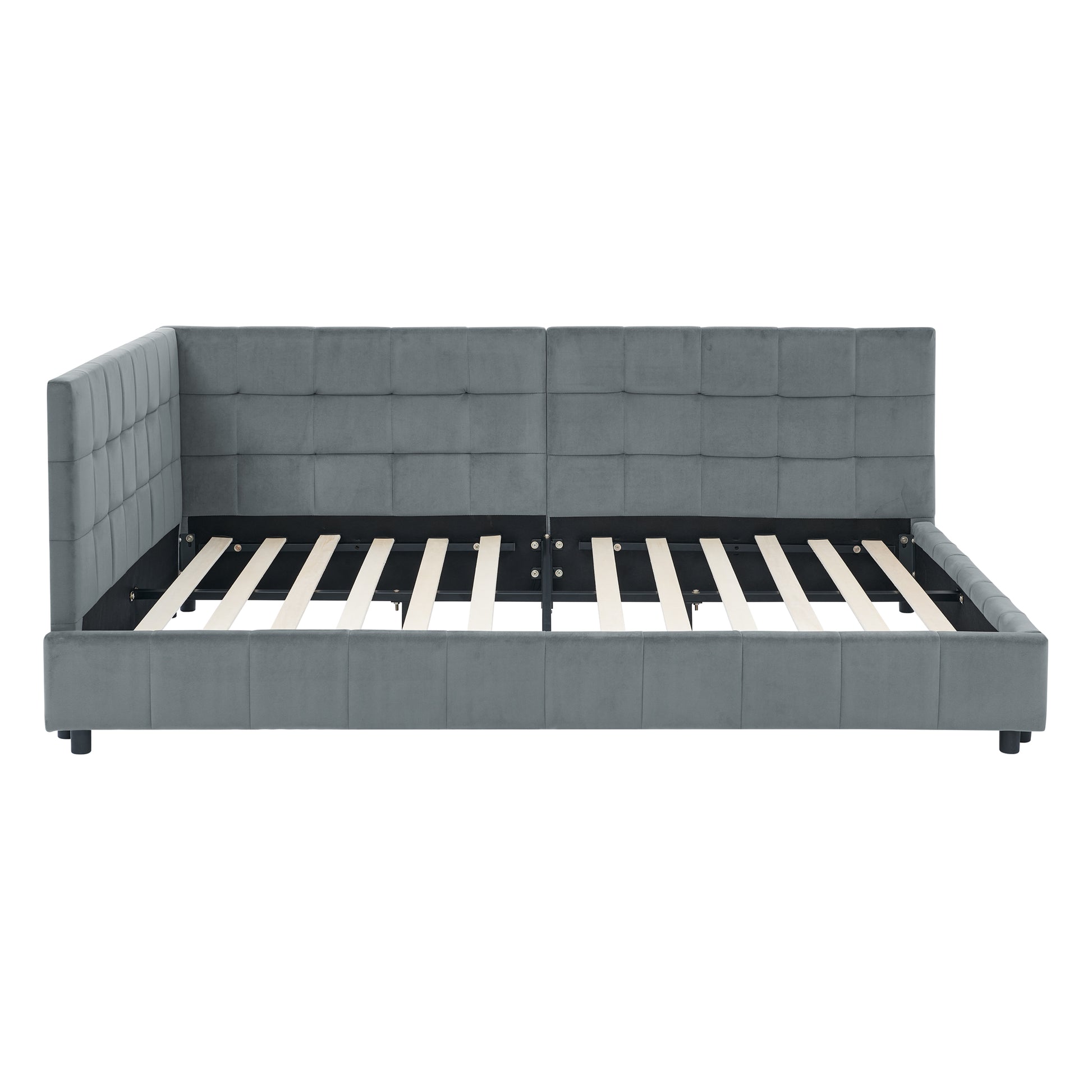Gray velvet tufted platform bed frame with a low profile design