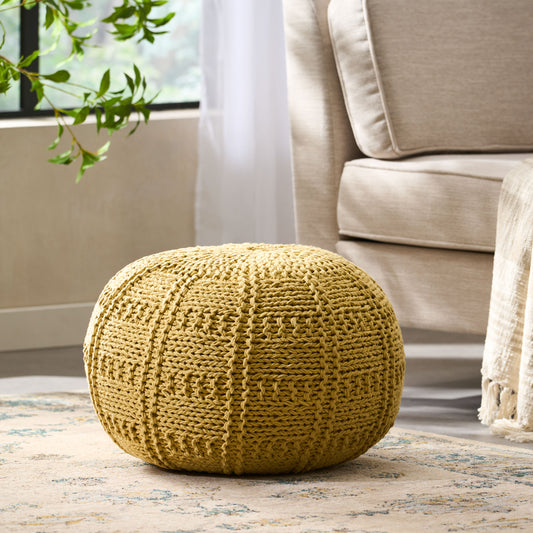 Round mustard yellow knit pouf with intricate texture perfect as footrest or seat