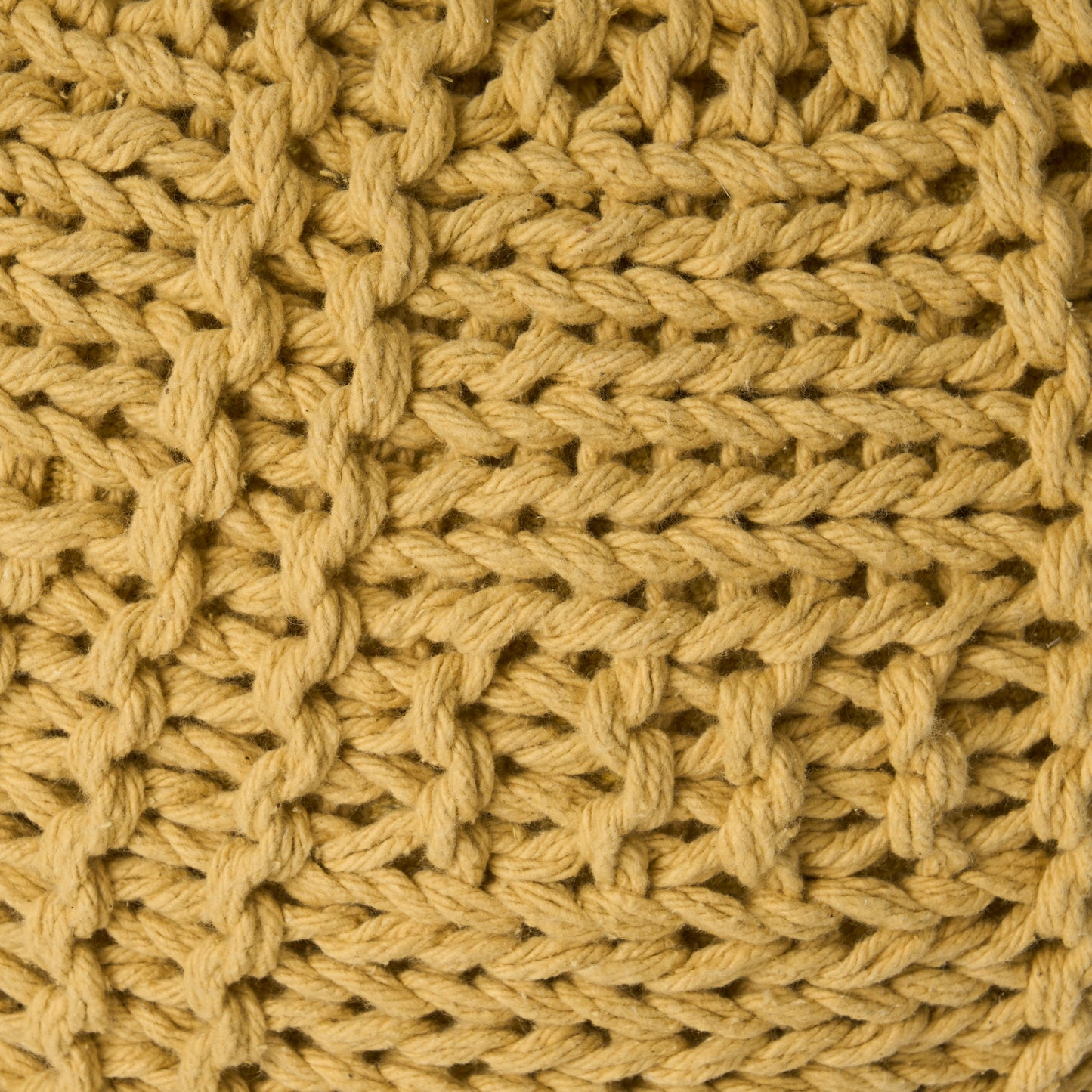Textured mustard yellow yarn knit fabric swatch