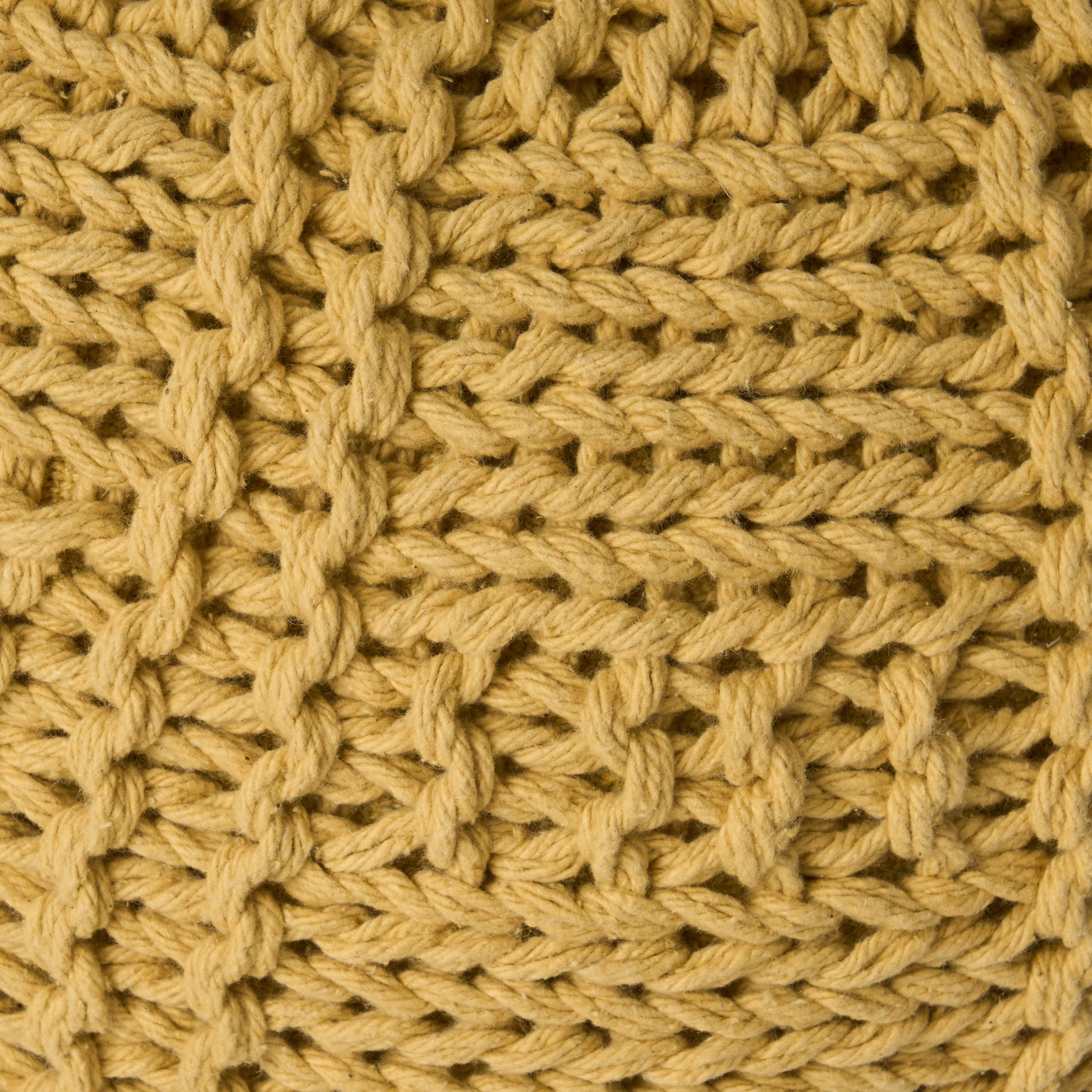 Textured mustard yellow yarn knit fabric swatch