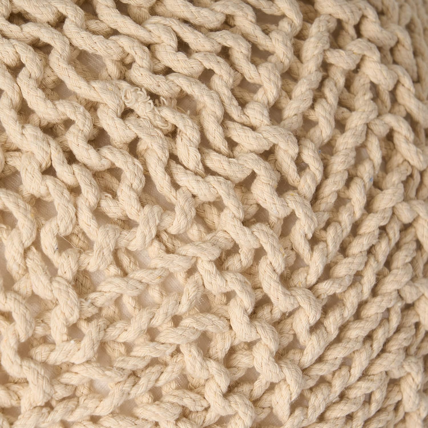 Closeup of a creamcolored woven rope basket texture