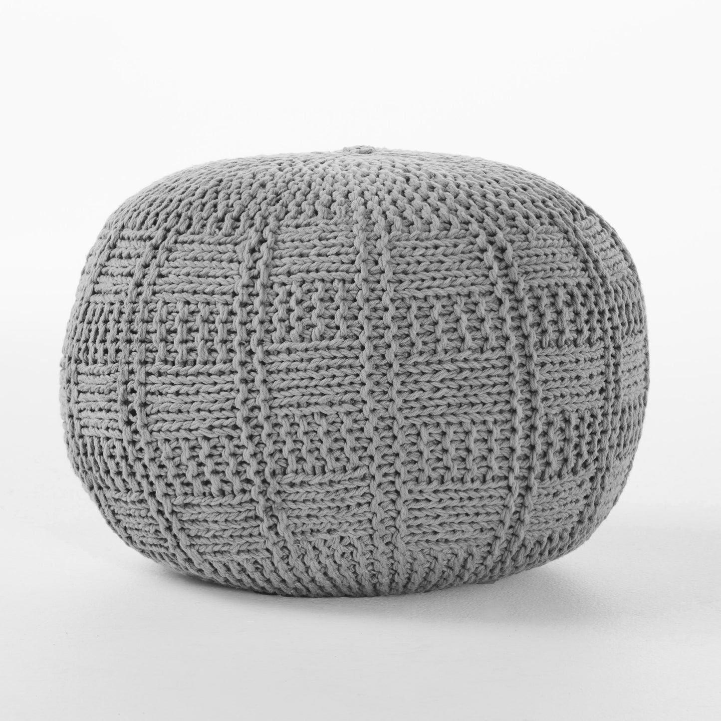 Gray knit ottoman with textured woven pattern adds cozy comfort