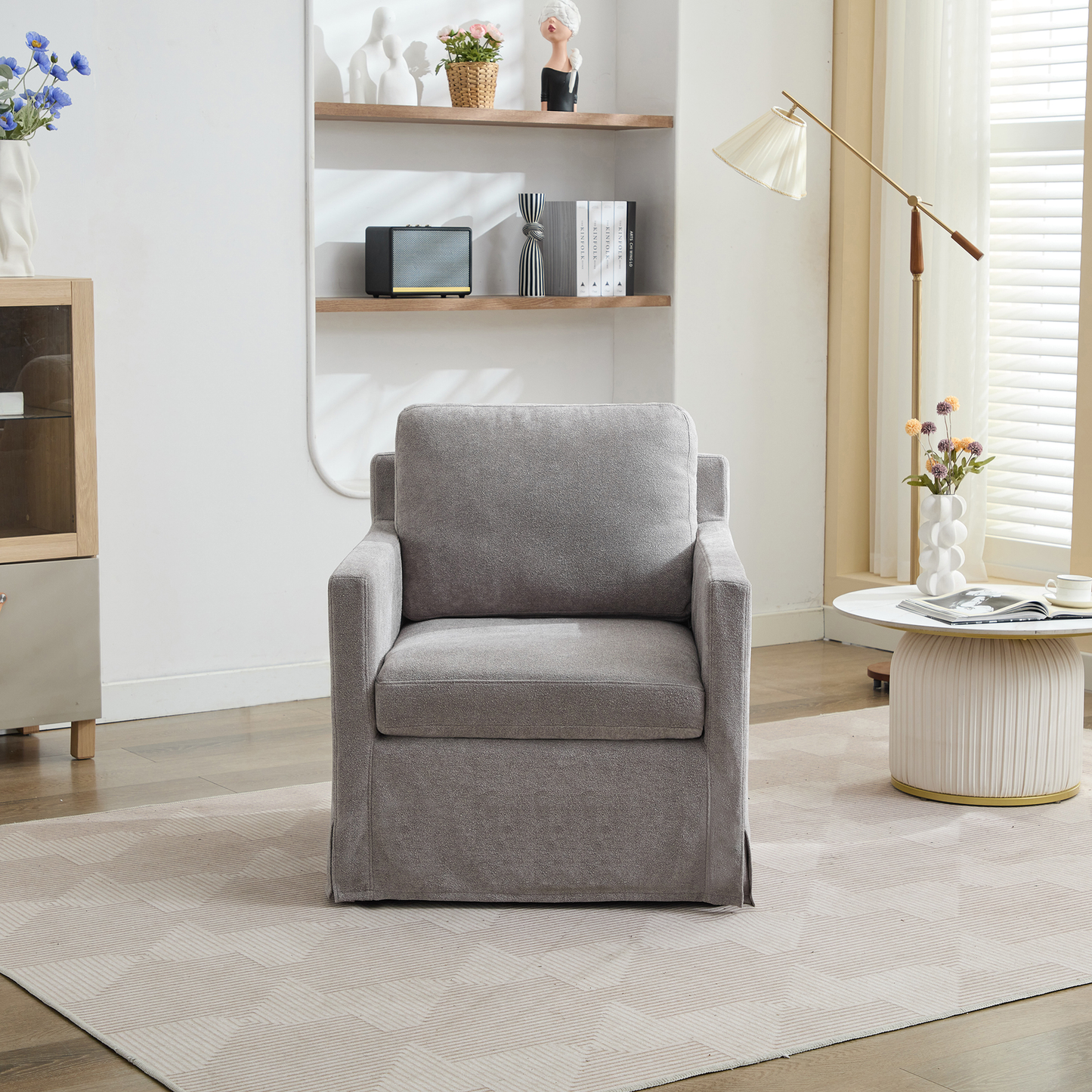 Plush gray fabric armchair with deep seat for ultimate comfort and relaxation