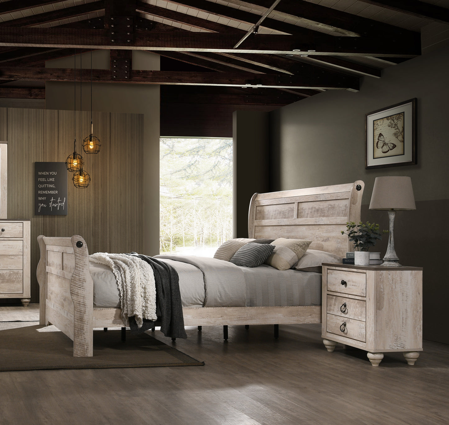Distressed white wood sleigh bed with gray and cream bedding