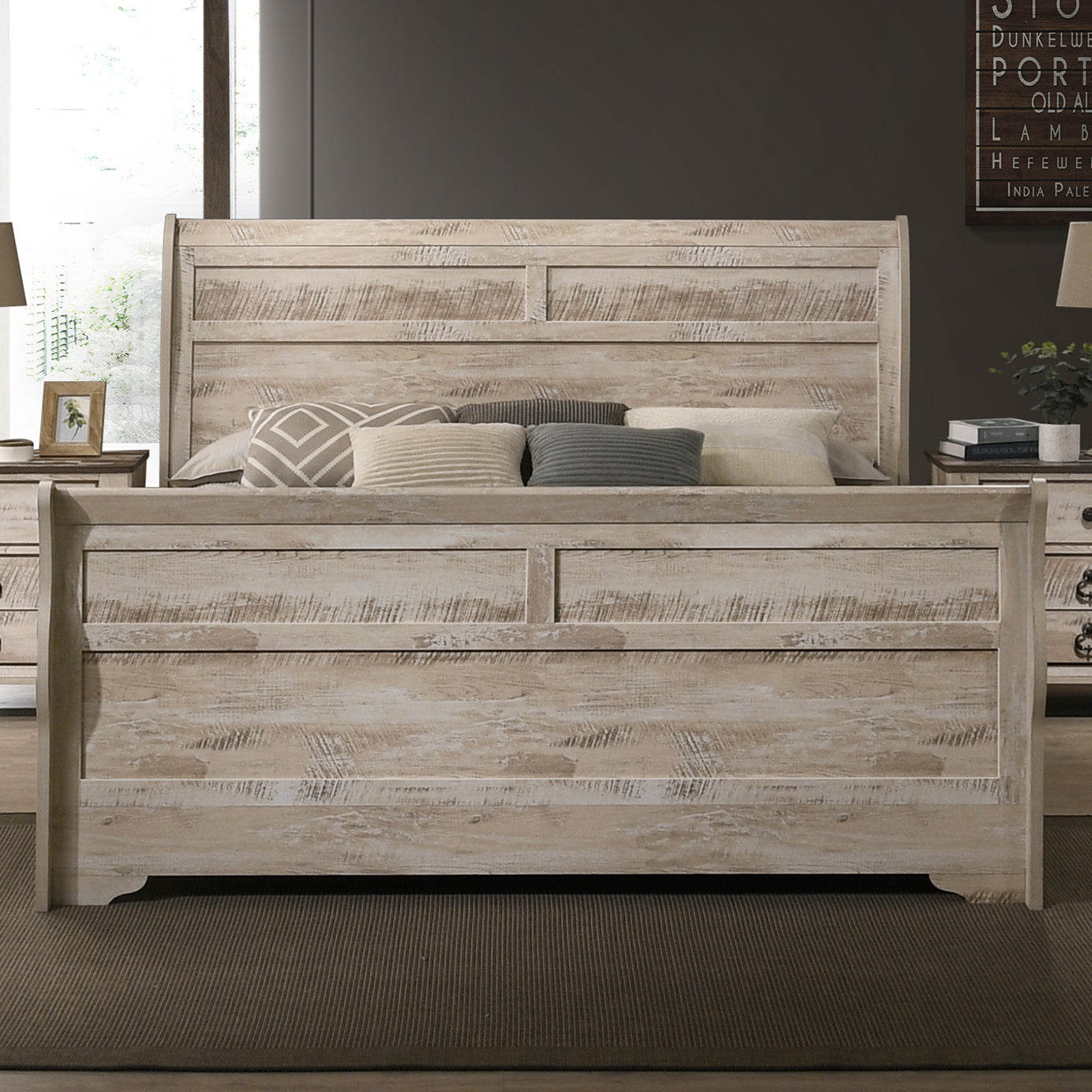 Whitewashed wood sleigh bed with horizontal paneling