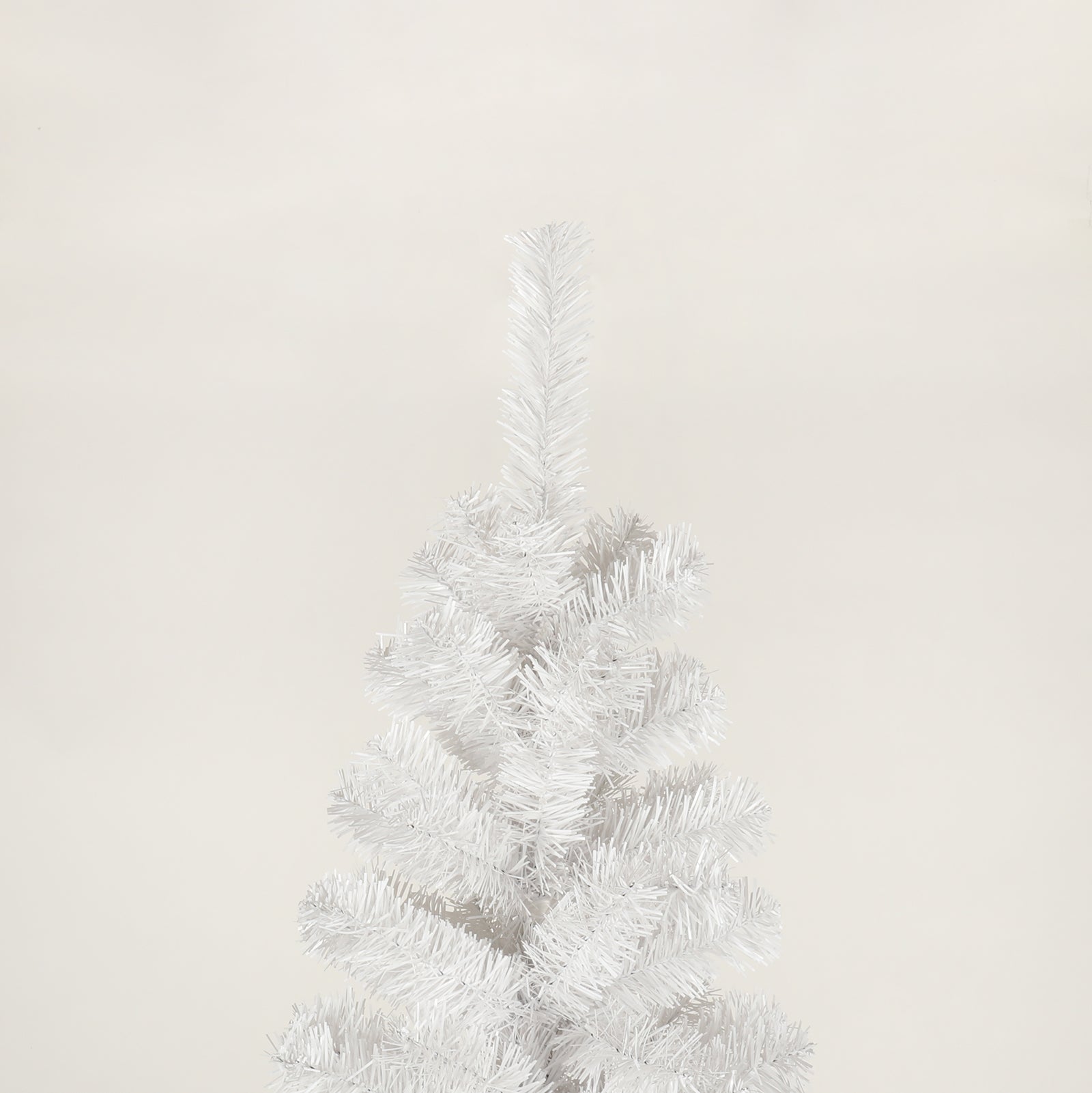 Realistic white artificial Christmas tree with dense realistic needles for holiday decor