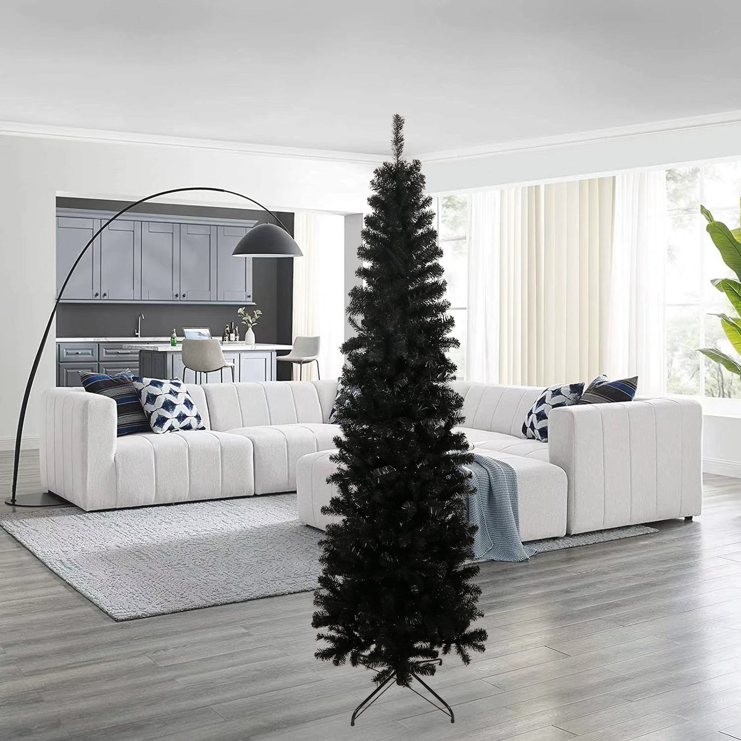 Tall artificial black Christmas tree with realistic branches perfect for modern decor