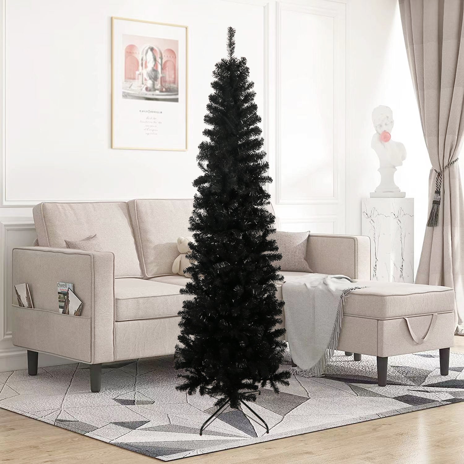 Tall slender black Christmas tree with a realistic flocked appearance perfect for modern holiday decor