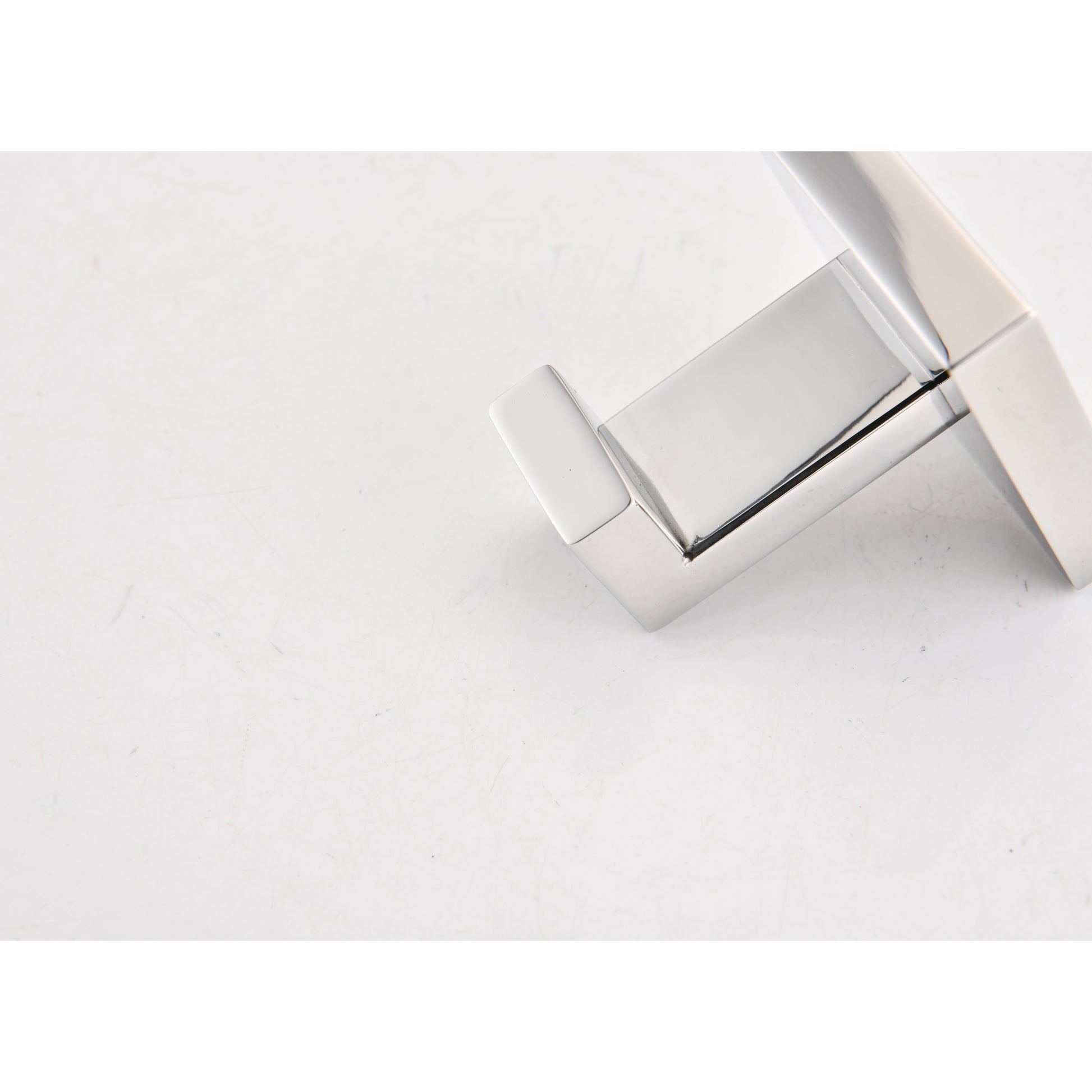 Modern polished chrome cabinet handle with a sleek minimalist design