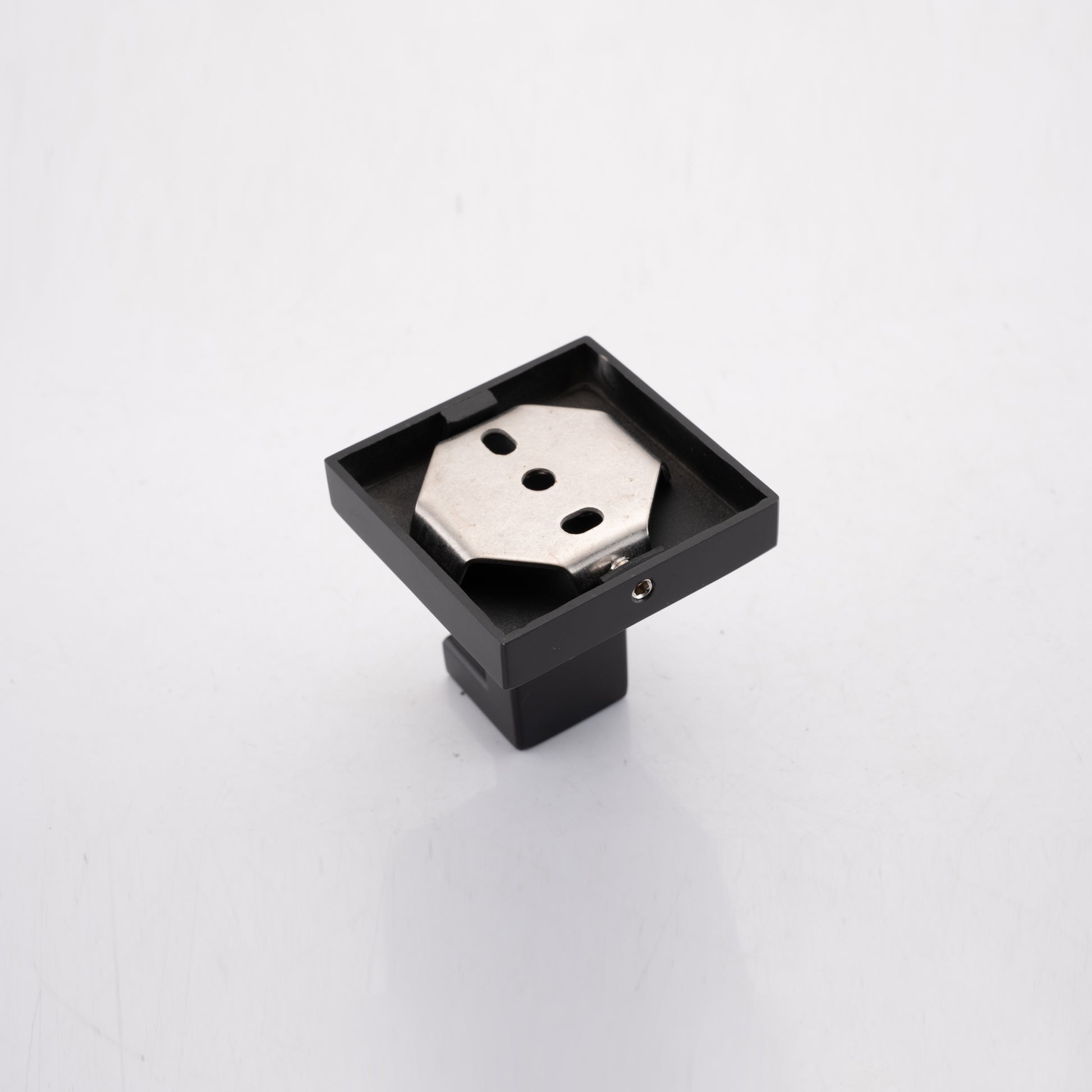 Black square base for shower head holder with brushed metal bracket