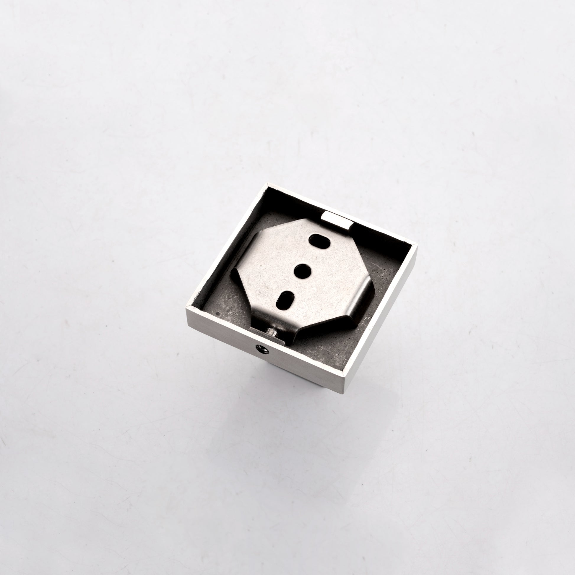 Brushed metal flush mount ceiling fixture base with brushed nickel finish and octagonal mounting plate