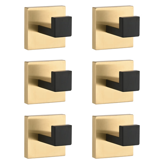 Set of  modern brushed brass coat hooks with matte black cubic projections