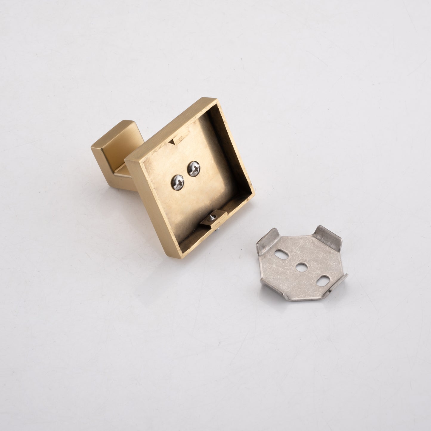 Brass toilet paper holder base with screws and mounting plate