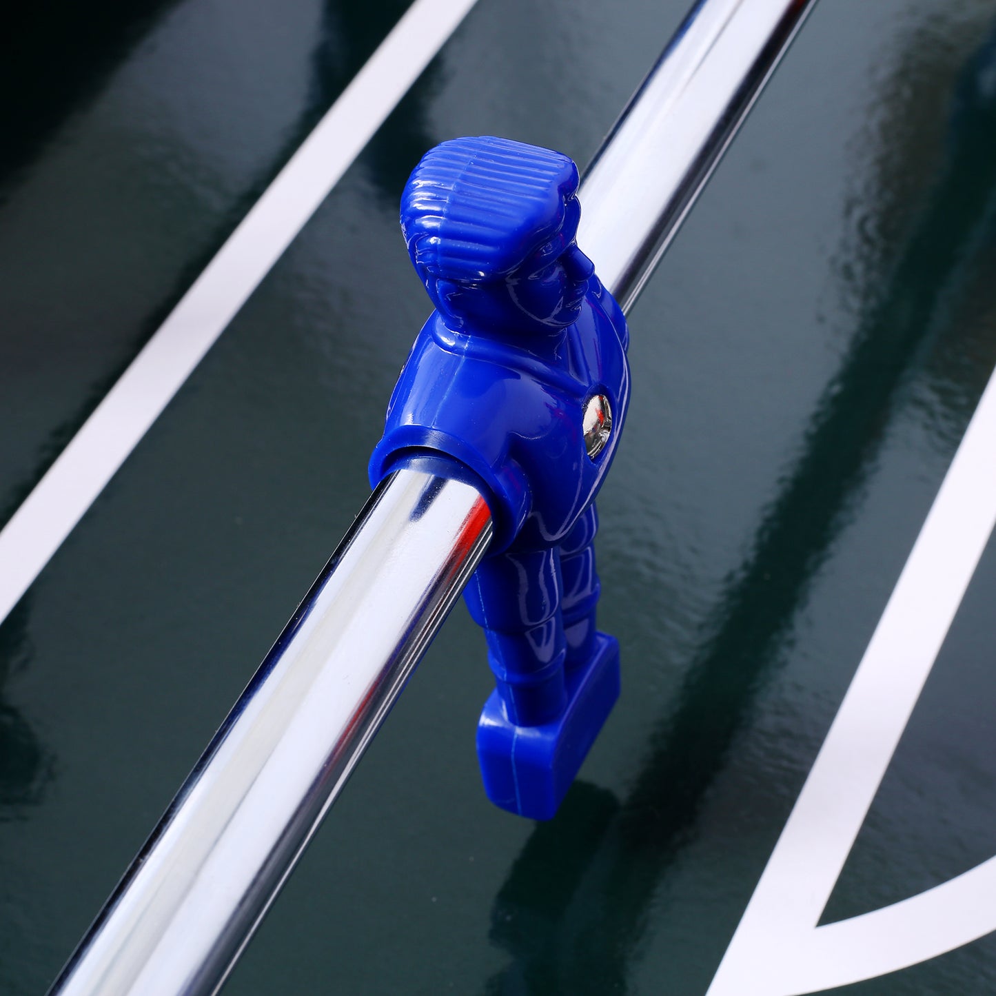 Blue plastic foosball player on a shiny chrome rod