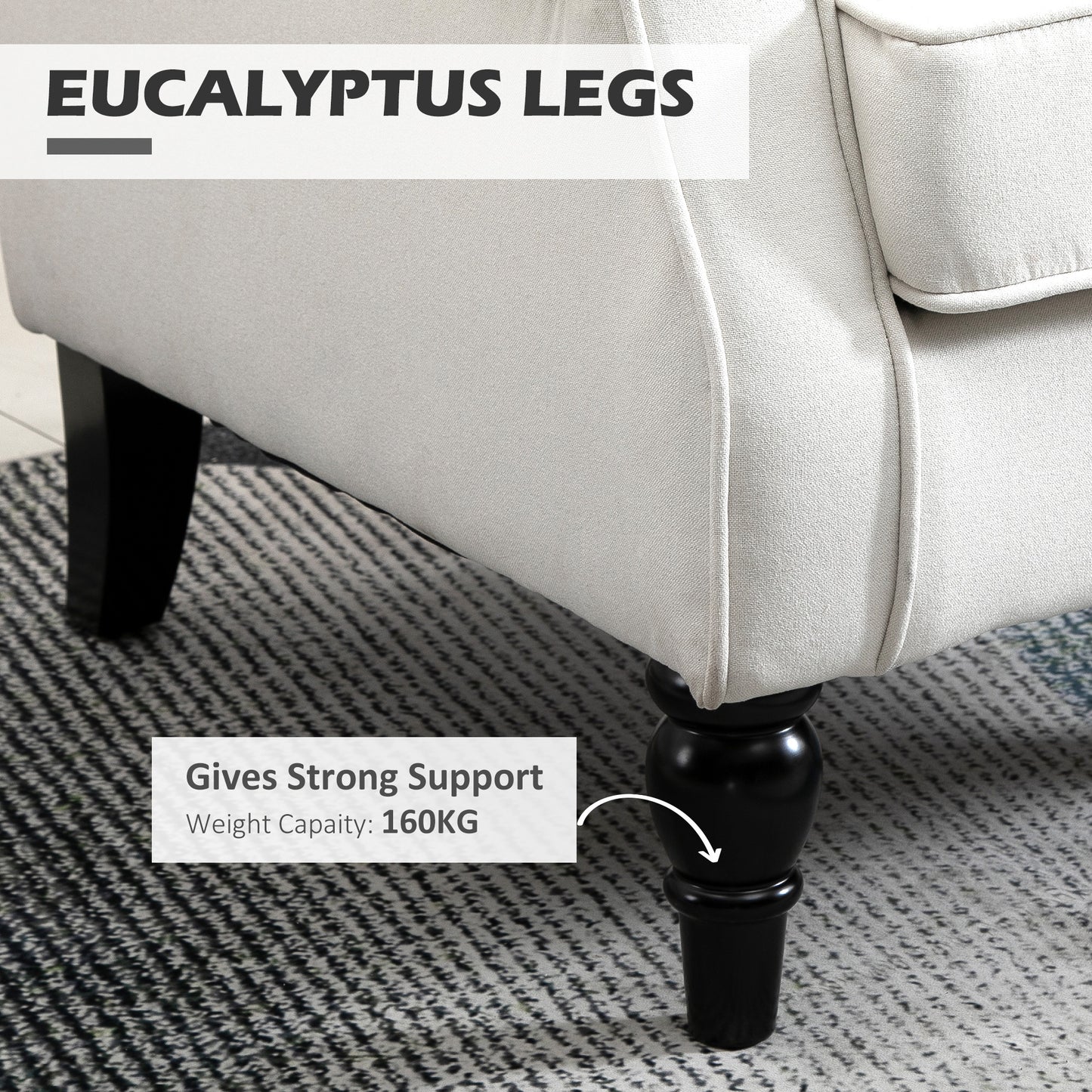 Closeup of a beige fabric armchair with sturdy eucalyptus legs showcasing craftsmanship