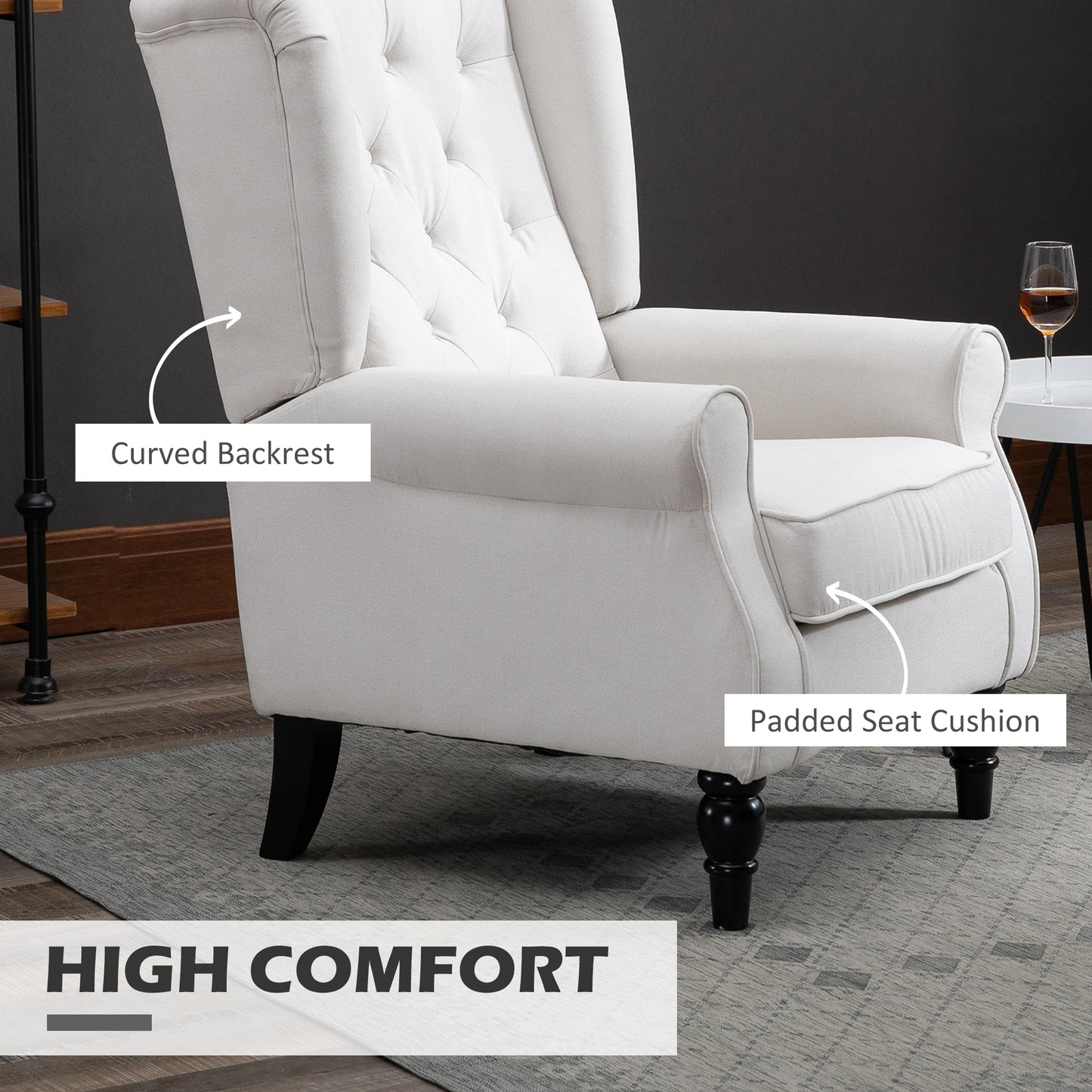 Cream upholstered wingback armchair with tufted back and padded seat