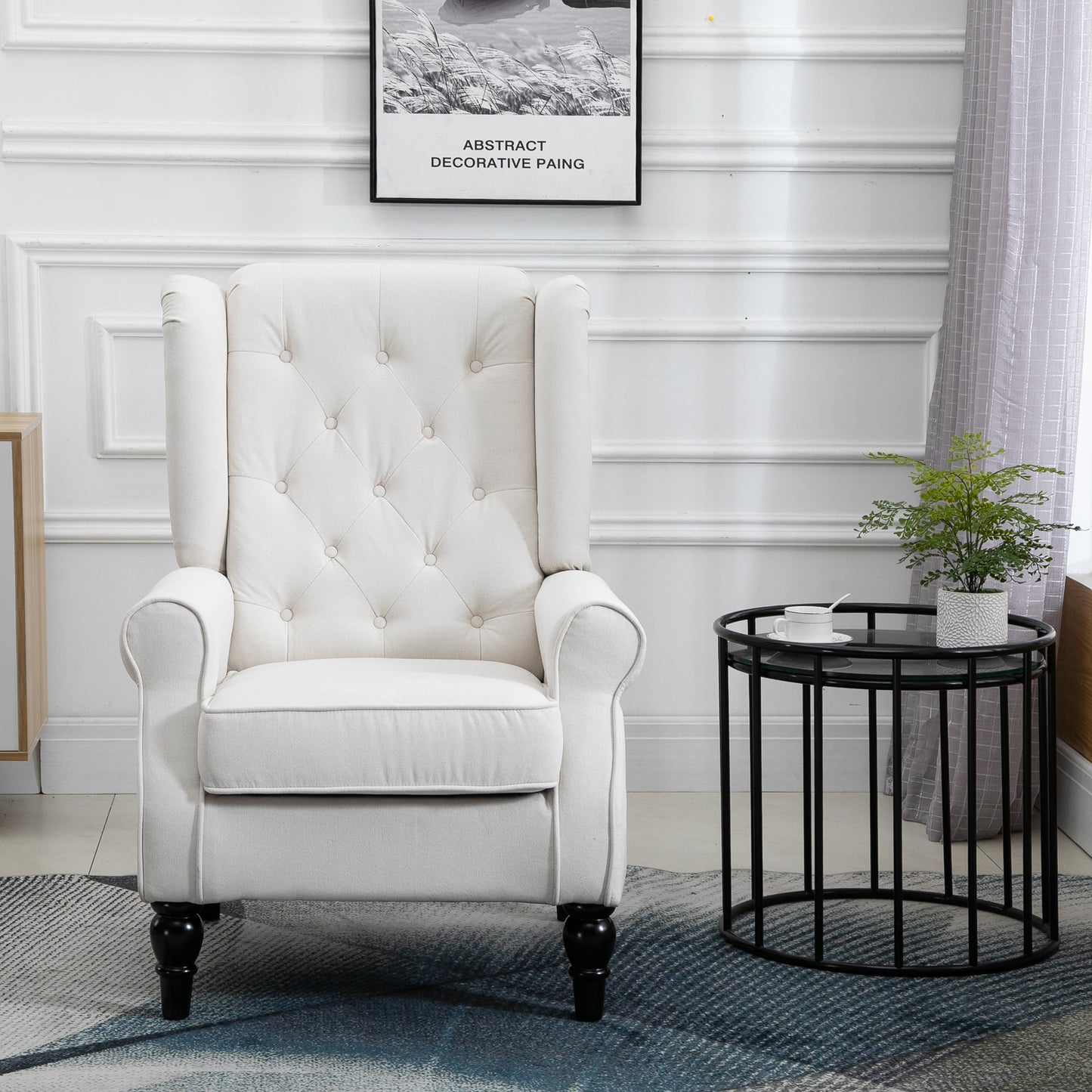 Cream fabric wingback chair with button tufting a reading accent chair