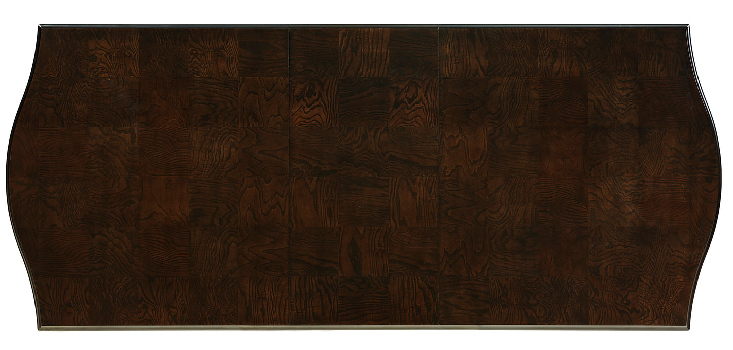 Rich dark wood dining table top with parquet inlay pattern
